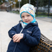 Zimní čepice spadená Dinouši tyrkysová Esito