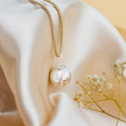 Těhotenská rolnička - andělské křídlo stříbrné s koženou černou šňůrkou