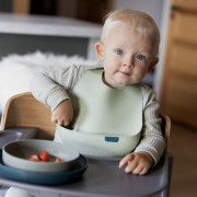 Silikonový bryndák s kapsou Lovi