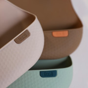 Silikonový bryndák s kapsou Lovi