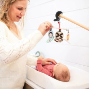 Wimmer kolotoč s klipem Stim to Go Manhattan Toy