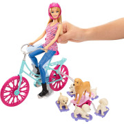 Barbie cyklistka a psí akrobati