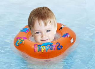 Plavací nákrčník Flipper oranžový od 2 let