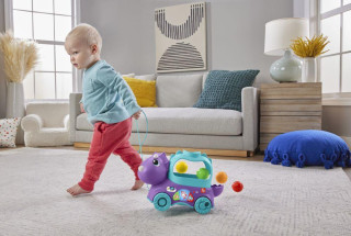 Fisher-price Hrající dino s vyskakujícími míčky