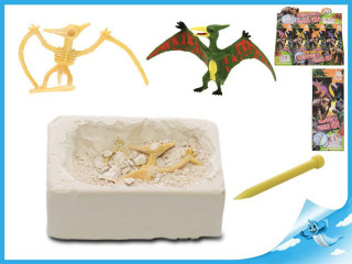 Dinosaurus 6 cm a zkamenělina v sádře s dlátem 