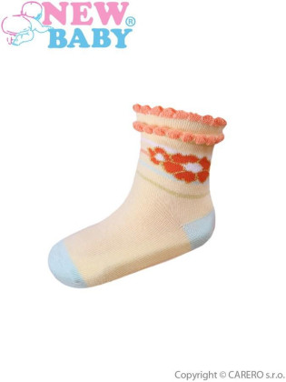 Kojenecké bavlněné ponožky New Baby žluté s kytičkou