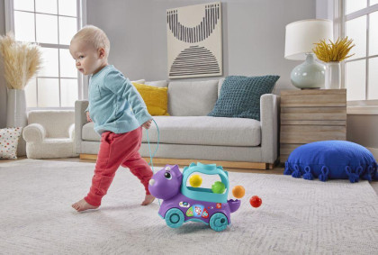 Fisher-price Hrající dino s vyskakujícími míčky