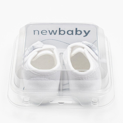 Kojenecké capáčky s mašličkou New Baby bílá