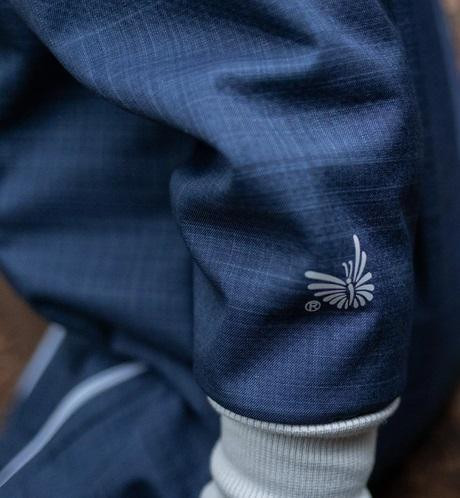 Rostoucí zimní softshellová kombinéza Lamb Navy Blue