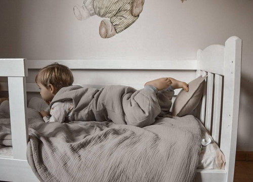 Dětský zateplený mušelínový spací pytel Kids soft s nožičkami Infantilo