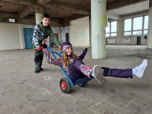 Softshellové kalhoty dětské Maskáč khaki Wamu