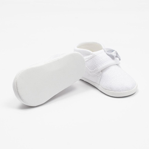 Kojenecké capáčky s mašličkou New Baby bílá
