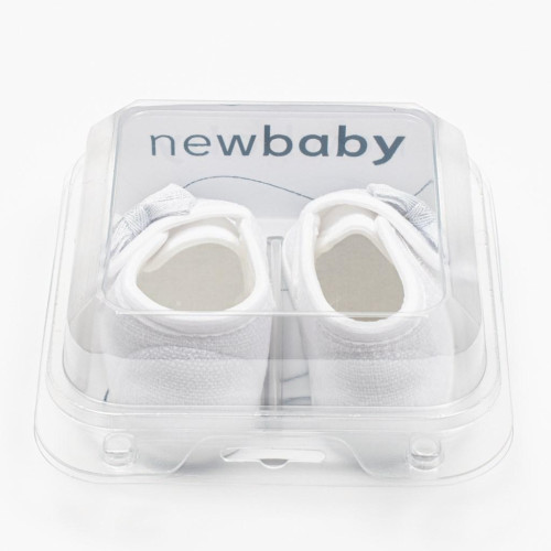 Kojenecké capáčky s mašličkou New Baby bílá