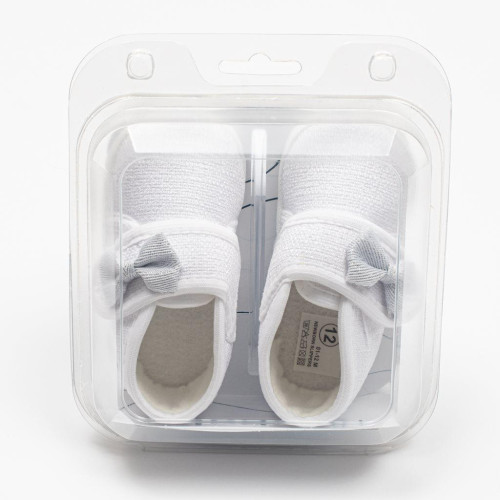 Kojenecké capáčky s mašličkou New Baby bílá