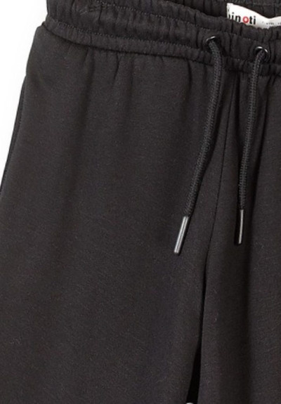Dětské tepláky s elastickým pasem a stahovací šňůrkou Černé Minoti