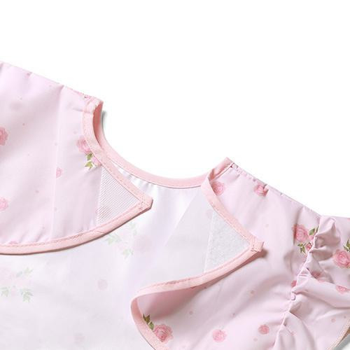 Nepromokavá zástěrka s volánky – bryndák Rose BabyOno