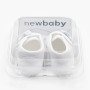 Kojenecké capáčky s mašličkou New Baby bílá